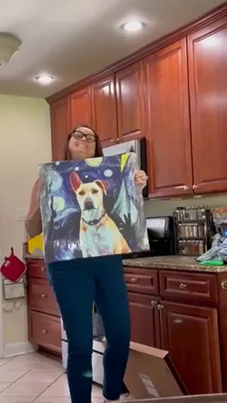A Your Dog is Art customer holding her Starry Night canvas of Georgina, her dog